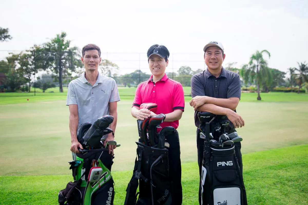 The team with PING staff bags